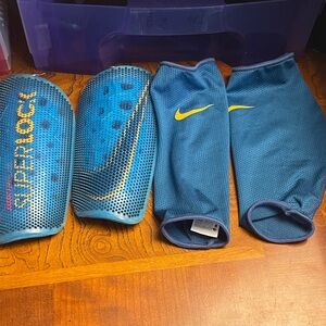 Nike Blue and Yellow Shin Guards with Sleeves